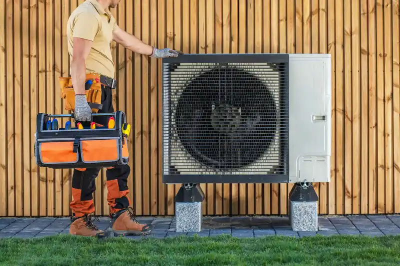 hvac technician standing by air conditioning unit 2025 03 14 11 45 40 utc 1 1